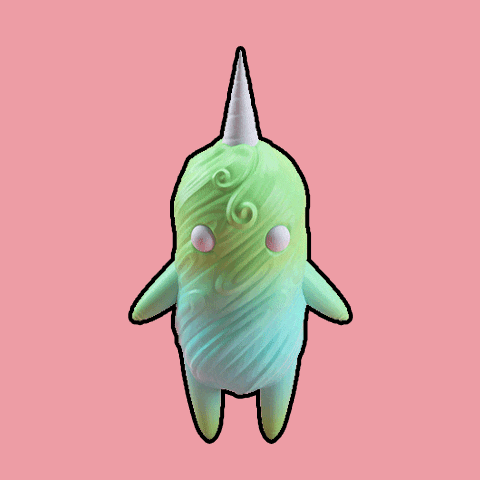 a stuffed animal with a unicorn horn on a pink background