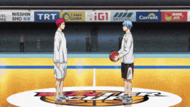 two basketball players are facing each other on a court with advertisements for current tama igi and nisshin