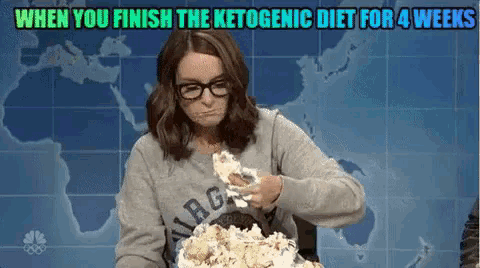 a woman eating popcorn with the words when you finish the ketogenic diet for 4 weeks below her