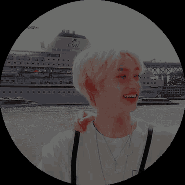 a person in a circle with a ship in the background that says cmv on it