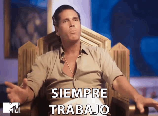 a man sitting in a chair with the words siempre trabajo written on the screen