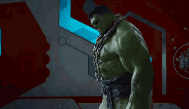 the hulk is standing in a room with a lot of lights