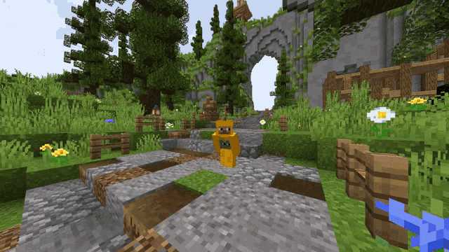 a screenshot of a minecraft game shows a statue in the grass