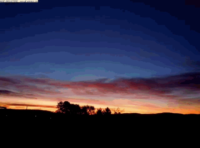 a picture of a sunset with a watermark that says ' gif '