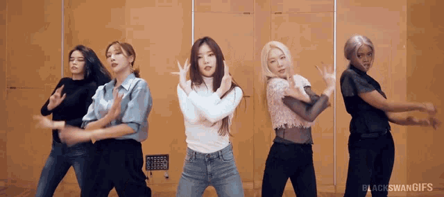 a group of women are dancing in a room and the words blackswangifs are on the bottom