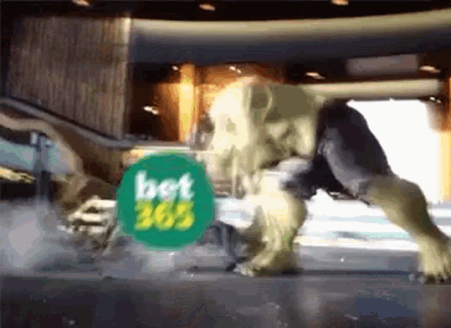 a hulk is standing next to a bet 365 logo