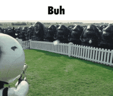 a bunch of statues are behind a white picket fence and the word buh is above them