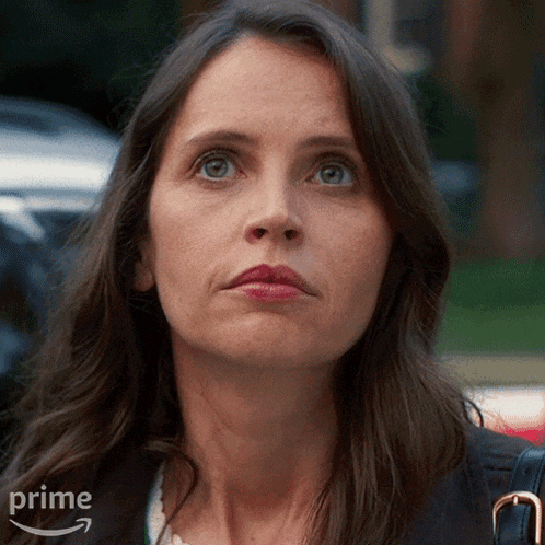a close up of a woman 's face with the word prime on the bottom