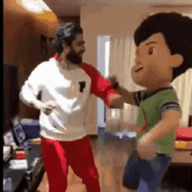 two men are dancing in a living room with a stuffed toy .