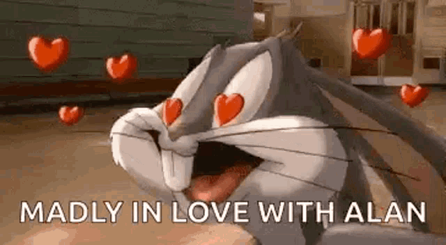 bugs bunny is madly in love with alan and has hearts coming out of his eyes .