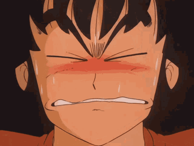 a close up of a cartoon character 's face with a red cheek