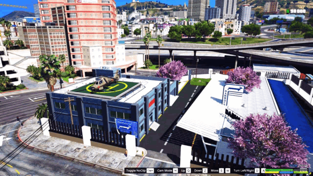 a screenshot of a video game with a helicopter on top of a building