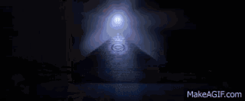 a dark room with a light coming out of the corner .