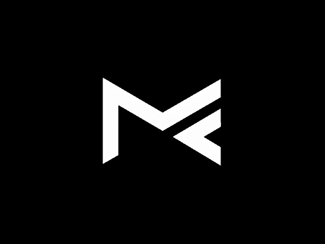 a white letter m on a black background with a diagonal arrow .