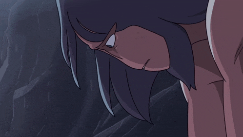 a close up of a person 's face with their mouth open