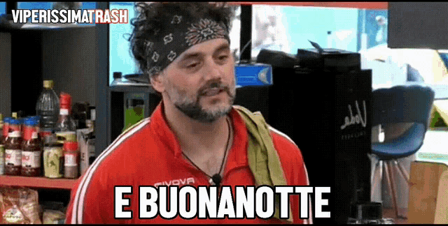 a man wearing a bandana and a red givova shirt says e buonanotte