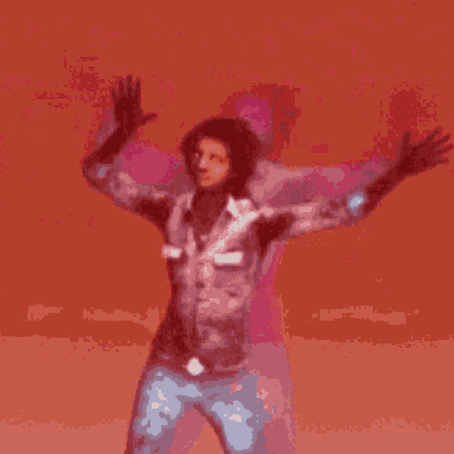 a pixelated image of a man with his arms outstretched