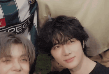 a close up of a person with a shirt that says peak