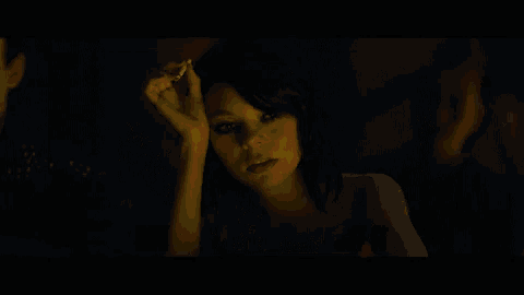 a woman smoking a cigarette with the words nothing to be done about it
