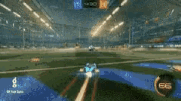 a rocket league game is being played and a car is flying through the air