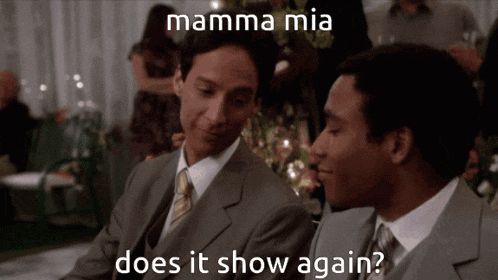 two men in suits and ties are sitting next to each other with mamma mia does it show again written below them