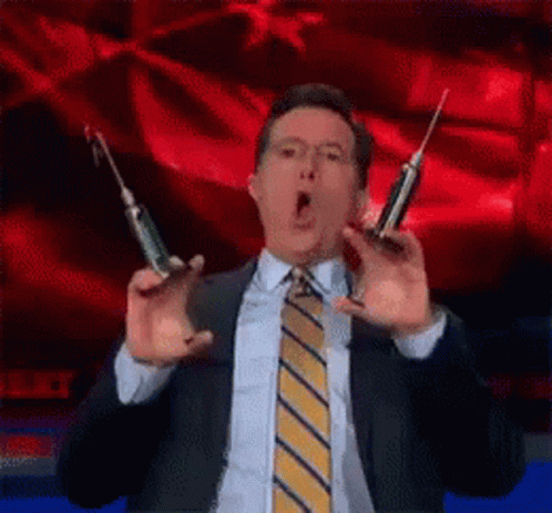 Stephen Colbert Syringes GIF - Stephen Colbert Syringes Shots GIFs