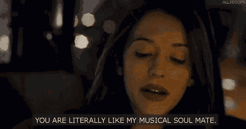 a close up of a woman 's face with the words `` you are literally like my musical soul mate . ''