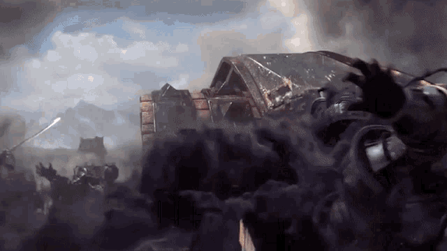 a group of people standing in front of a burning building