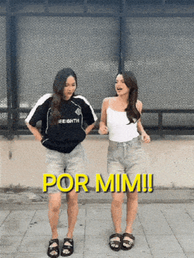 two women are standing next to each other with the words por mim written on the bottom