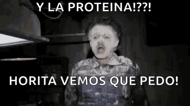 a man with white paint on his face and the words y la proteina