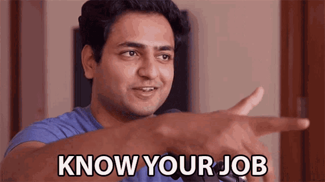a man in a blue shirt is pointing at the camera and says know your job