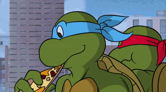 two teenage mutant ninja turtles are eating pizza