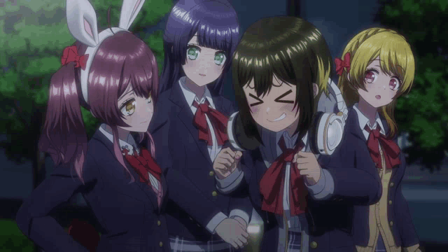 a group of anime girls are posing for a picture