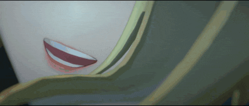 a close up of a person 's face with a smile