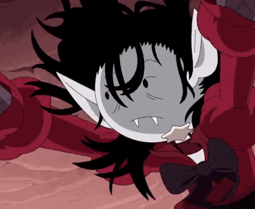 a cartoon character with fangs and a bow tie