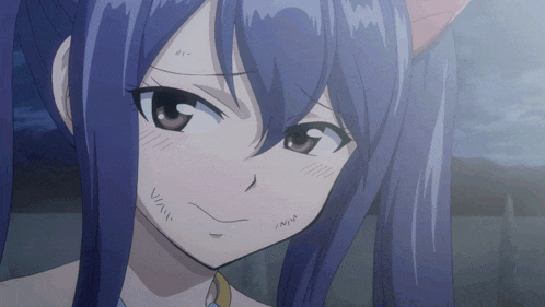 a close up of a girl 's face with a few letters on it