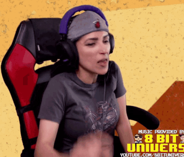 a woman wearing headphones is sitting in a chair with the words 8 bit univers on the bottom