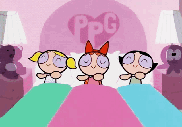three cartoon girls are laying in a bed with a heart that says ppg