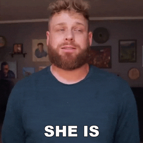 a man with a beard says " pretty good " in white letters