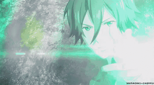 a boy with green hair is pointing his finger at the camera