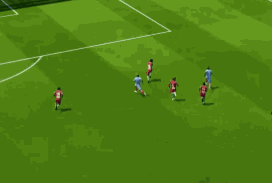 a soccer game is being played on a field with an advertisement for fifa 1967 in the background