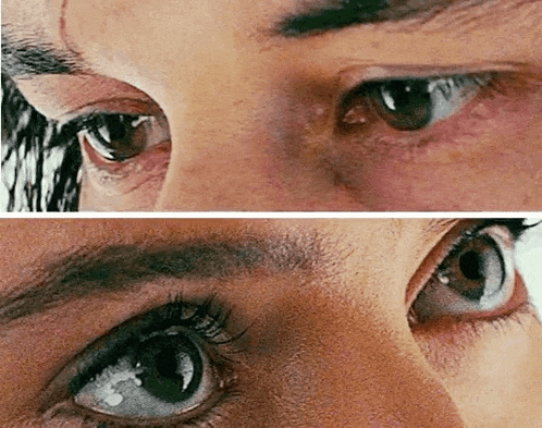 a close up of a man 's and woman 's eyes
