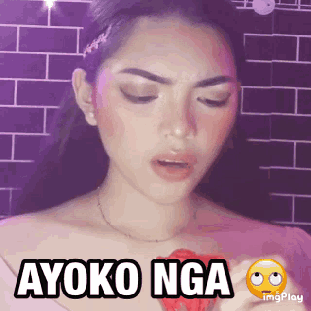 a picture of a woman with the words ayoko nga written on it