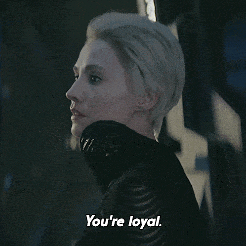 a woman says you 're loyal in a black shirt