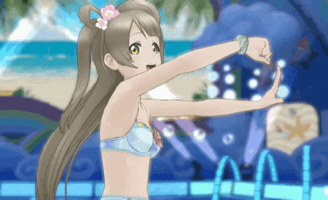 a girl in a bikini is dancing in front of a pool