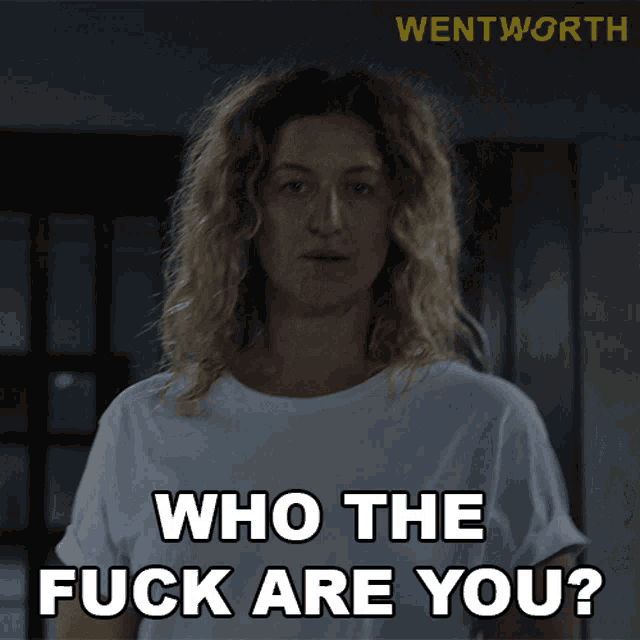 a woman in a white shirt says " who the fuck are you ? "