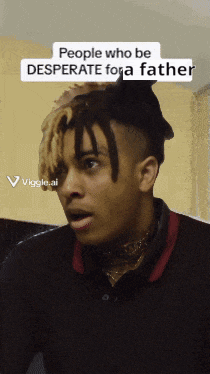 a man with dreadlocks and a black shirt says people who be desperate for a father