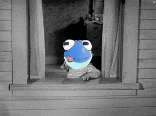 a frog with big eyes is sticking its tongue out of a window