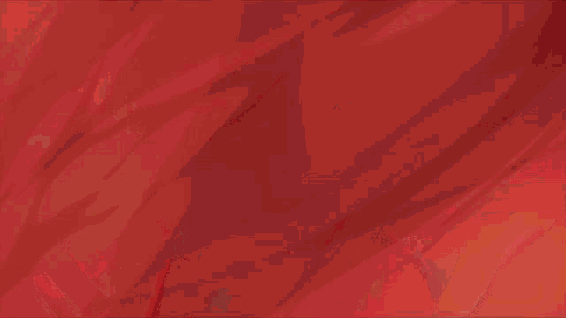 a close up of a red background with a few white lines