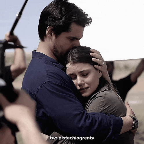 a man hugging a woman with the hashtag pistachiogrentv on the bottom right